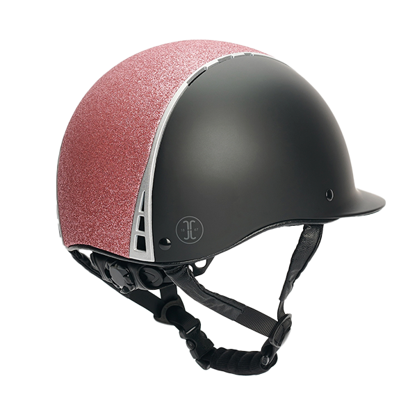 Jacson Philly Mips Ridhjälm Svart/Rosa är en säker, bekväm och stilfull ridhjälm som verkligen sticker ut med sina rosa glitterdetaljer!