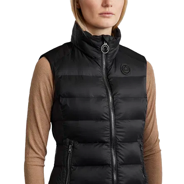 Montar Moathena Bodywarmer är en exklusiv väst som är designad för att framhäva din figur med en skräddarsydd passform som elegant markerar midjan.