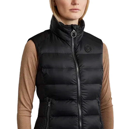 Montar Moathena Bodywarmer är en exklusiv väst som är designad för att framhäva din figur med en skräddarsydd passform som elegant markerar midjan.